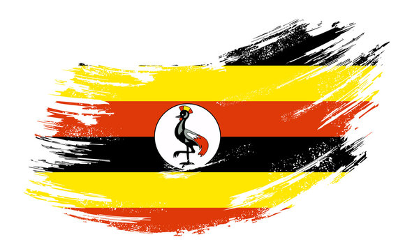 Ugandan flag grunge brush background. Vector illustration.
