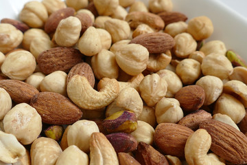 Fresh dried nuts, almonds and cashews, close-up, crispy nuts,
