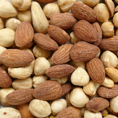 Fresh dried nuts, almonds and cashews, close-up, crispy nuts,