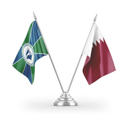 Qatar and Martinique table flags isolated on white 3D rendering