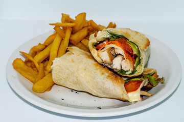 Chicken wraps with french fries.