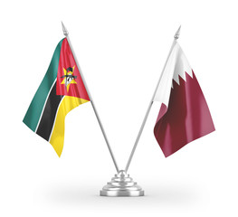 Qatar and Mozambique table flags isolated on white 3D rendering