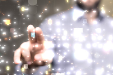 Businessman pressing document icon over computer binary code