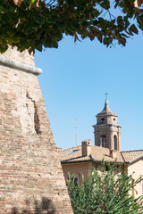Obraz premium City wall and tower of church in Fano, Italy