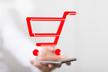 Businessman pressing modern technology panel shopping cart web phone credit card.