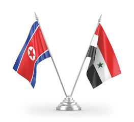 Syria and North Korea table flags isolated on white 3D rendering