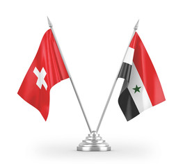 Syria and Switzerland table flags isolated on white 3D rendering