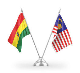 Malaysia and Bolivia table flags isolated on white 3D rendering