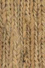natural woven seagrass beach mat fibers close up texture with brightlight