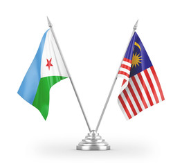 Malaysia and Djibouti table flags isolated on white 3D rendering