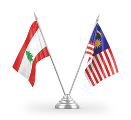 Malaysia and Lebanon table flags isolated on white 3D rendering
