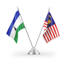 Malaysia and Lesotho table flags isolated on white 3D rendering