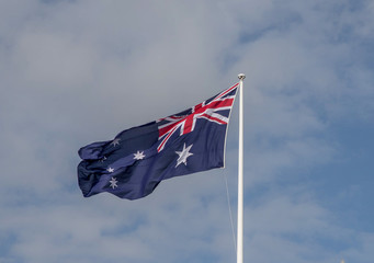 australia flag in front of blue sky