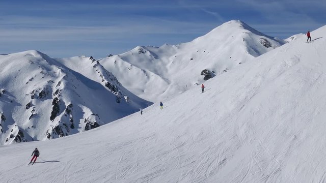 Skiers on ski slopes in Horberg area, Mayrhofen ski resort, Tyrol, Austria.