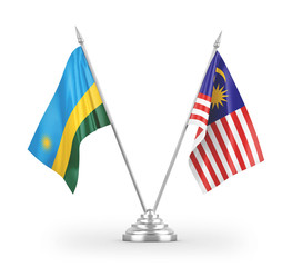 Malaysia and Rwanda table flags isolated on white 3D rendering