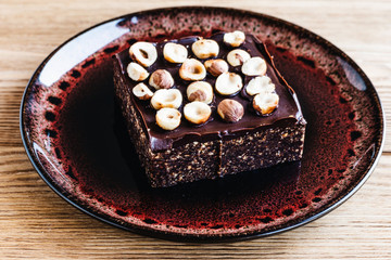 Chocolate cake with hazelnuts. Dessert with nuts.