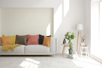 Modern living room in white color with sofa. Scandinavian interior design. 3D illustration