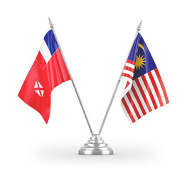 Malaysia and Wallis and Futuna table flags isolated on white 3D rendering