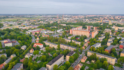 Fototapeta na wymiar Beautiful panoramic Aerial view photo from flying drone on Klaipeda city center on a summer evening at sunset. Klaipeda, Lithuania (series)