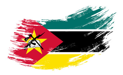 Mozambique flag grunge brush background. Vector illustration.