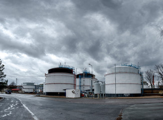 Obraz premium Fuel depod with recuperation station on foreground, Czech Republic