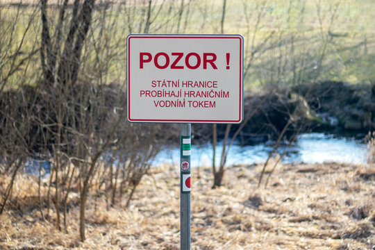 state border warning signs "Beware! state borders run across a border watercourse", Cetviny, Czech republic