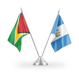 Guatemala and Guyana table flags isolated on white 3D rendering