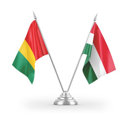 Hungary and Guinea table flags isolated on white 3D rendering