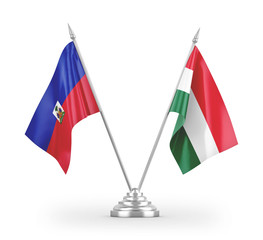 Hungary and Haiti table flags isolated on white 3D rendering