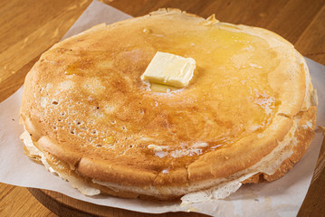 Sweet Homemade Stack of Pancakes with Butter and Honey