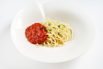 Spaghetti with tomato sauce and herbs