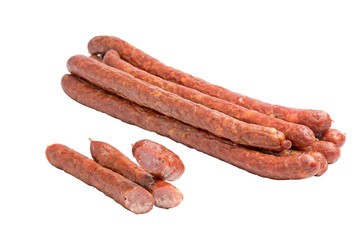 Dried pork sausage, smoked meat, close-up, isolated on white background