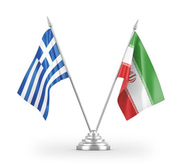 Iran and Greece table flags isolated on white 3D rendering