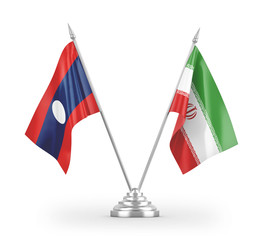 Iran and Laos table flags isolated on white 3D rendering.