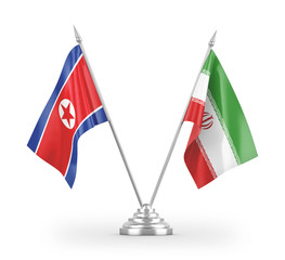 Iran and North Korea table flags isolated on white 3D rendering