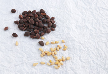 pine nuts on white crumpled paper