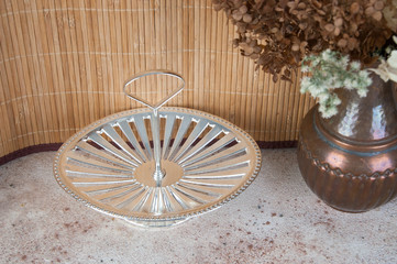 Antique silver serving dish with ring handle