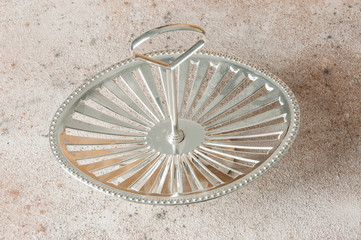 Antique silver serving dish with ring handle