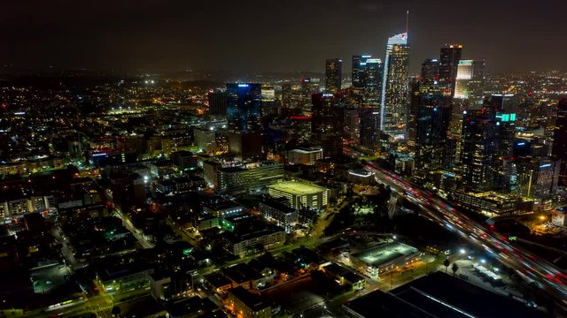 Los Angeles Aerial v249 Hyperlapse, moving SW in reverse looking back at downtown tall buildings skyline with traffic - October 2019