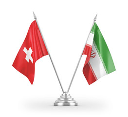 Iran and Switzerland table flags isolated on white 3D rendering