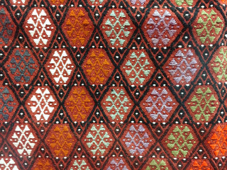 Traditional Turkish carpet. Ornamental geometric pattern.