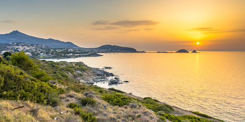Fototapeta premium Golden sunset over Ile Rousse