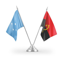 Angola and Micronesia table flags isolated on white 3D rendering