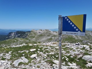 Flag of Bosnia-Herzegovina on the mountain top