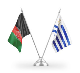 Uruguay and Afghanistan table flags isolated on white 3D rendering