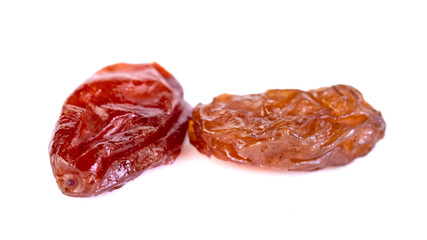 Raw raisins, dried grape isolated on white background