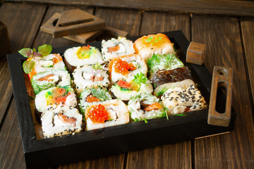 Various kinds of sushi food served on square frame