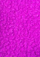 Pink wool fibrous fabric texture as background