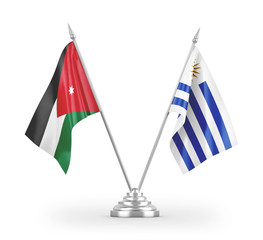 Uruguay and Jordan table flags isolated on white 3D rendering