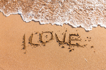 I love you written on the beach